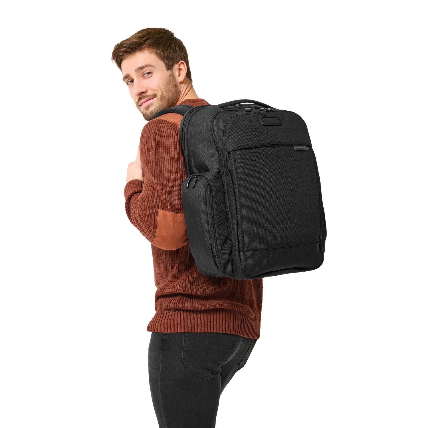 Briggs and Riley Traveler Backpack Black On Figure View #color_black