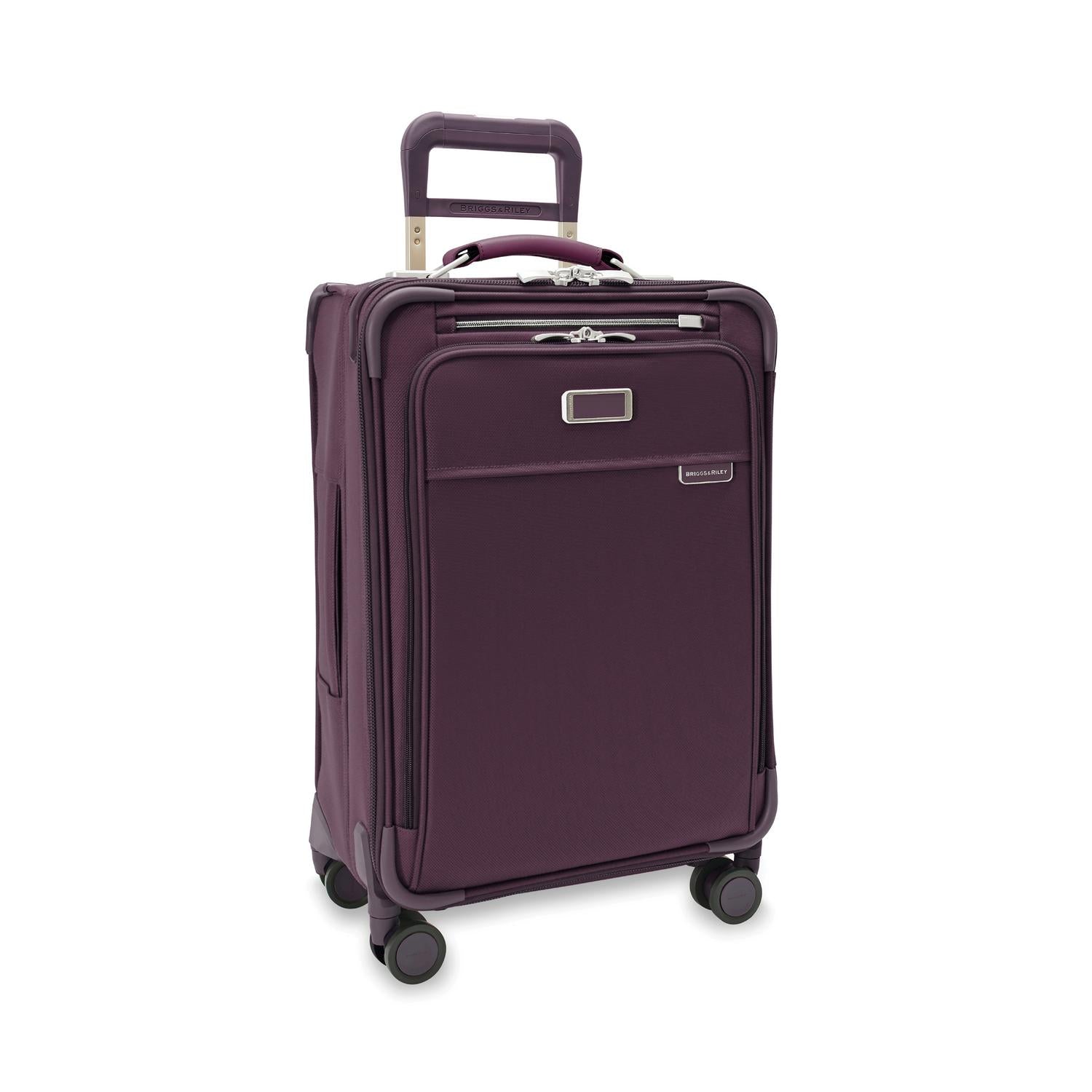 Baseline Essential 22" Carry-On Expandable Spinner Plum Side View #color_plum