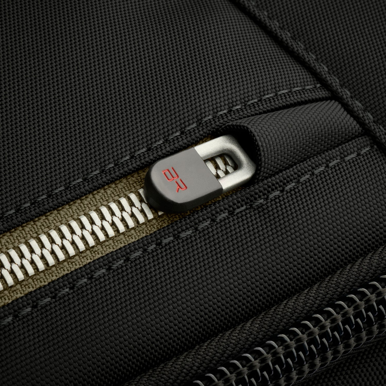 Briggs and Riley HTA Medium Expandable Brief Black Zipper Close-up #color_black