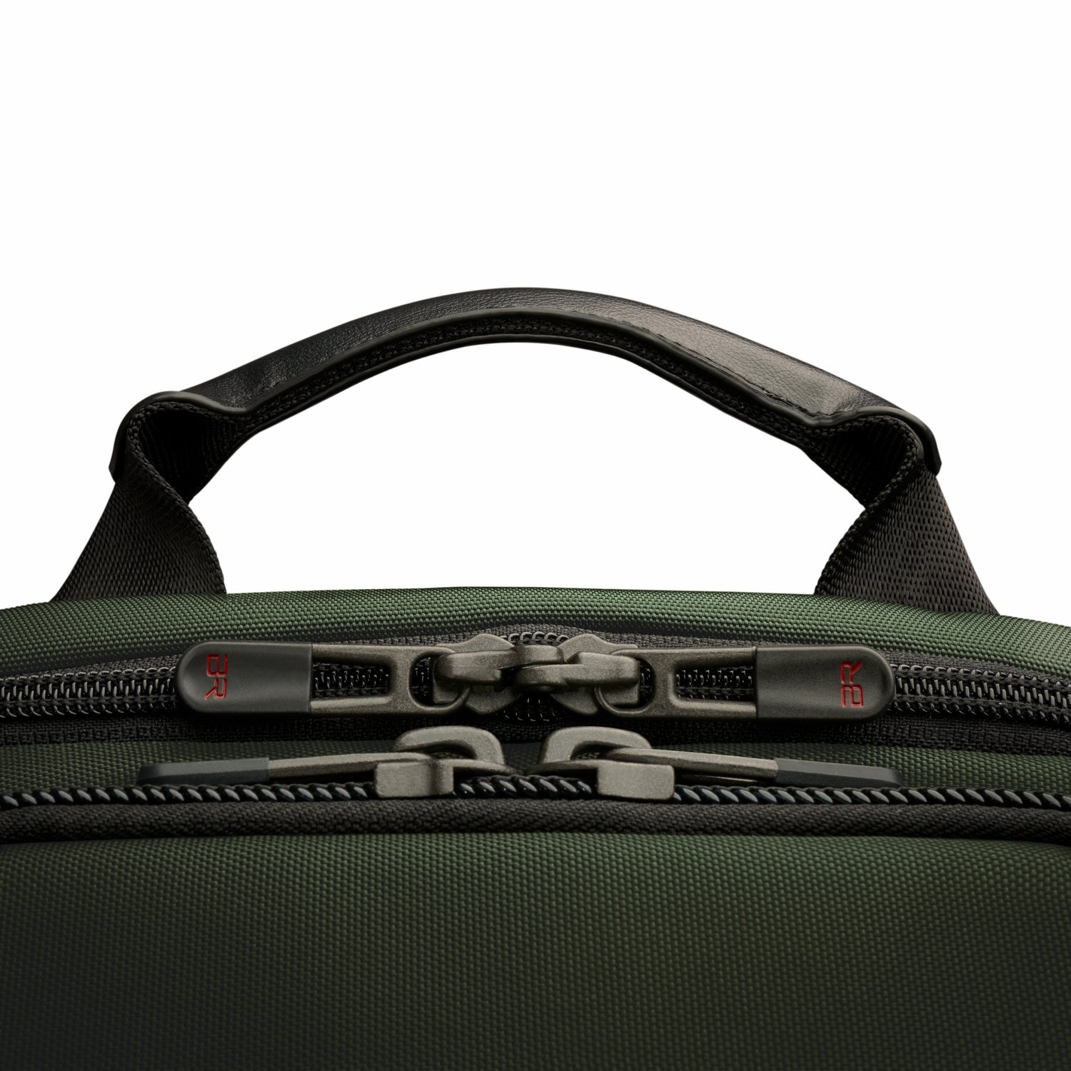 Briggs & Riley Slim Expandable Backpack Forest Close-up of leather handle and zippers #color_forest