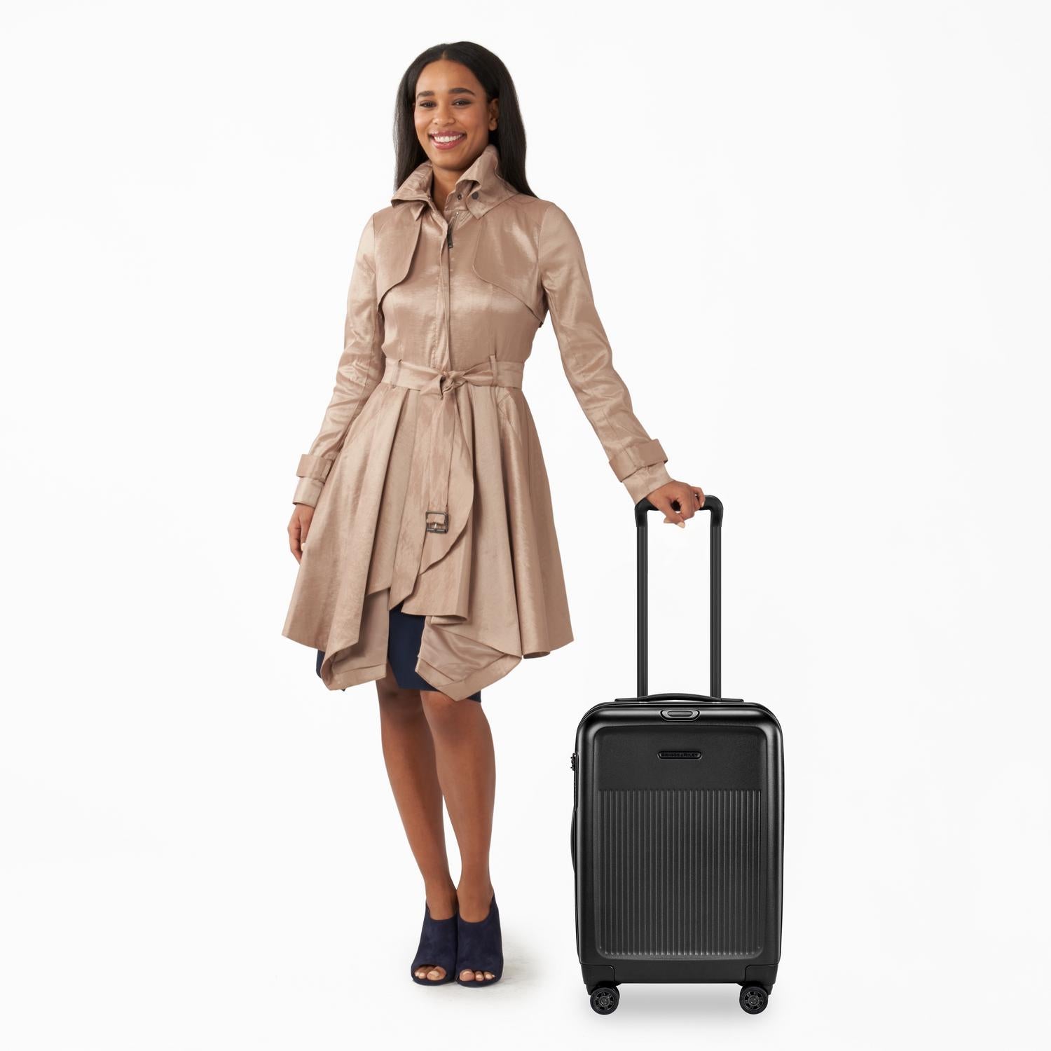 Briggs and Riley Sympatico International Carry-On Expandable Spinner Black with Person #color_black