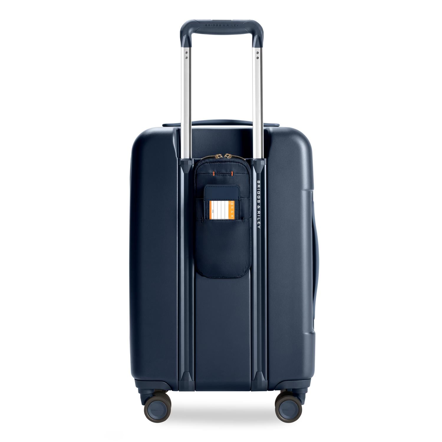 Essential Carry-On Expandable Spinner in Navy, Back View #color_navy