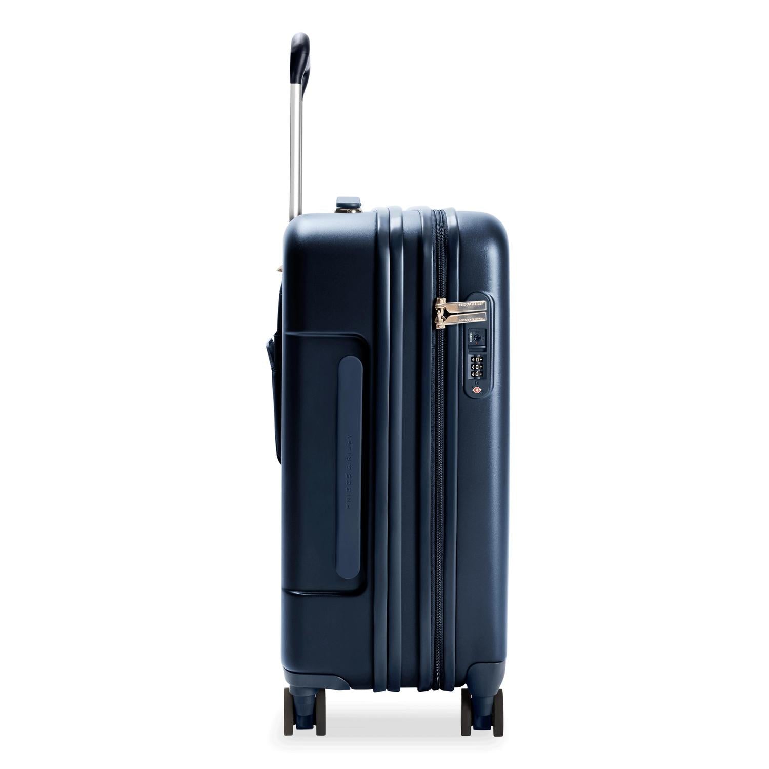 Essential Carry-On Expandable Spinner in Navy, Side View #color_navy