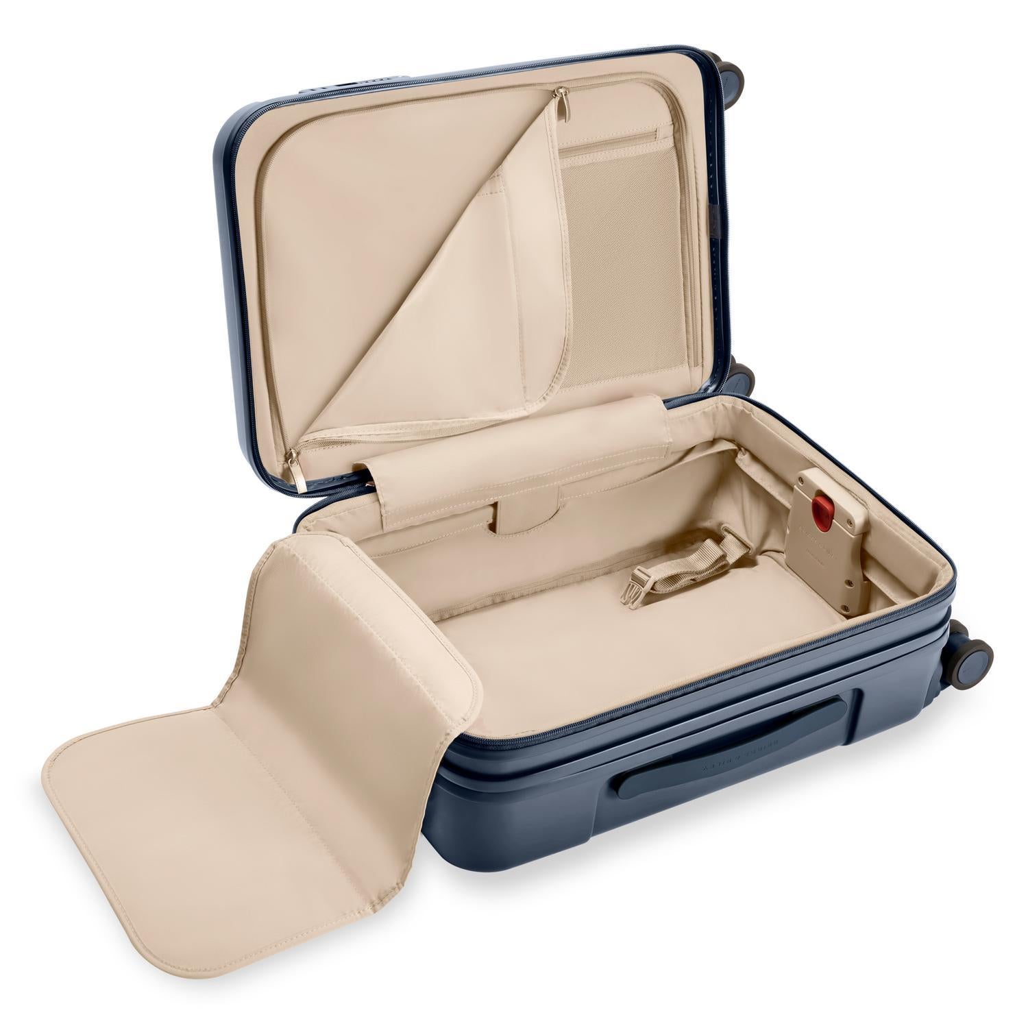 Essential Front Pocket Carry-On Expandable Spinner in Navy, Front View #color_navy