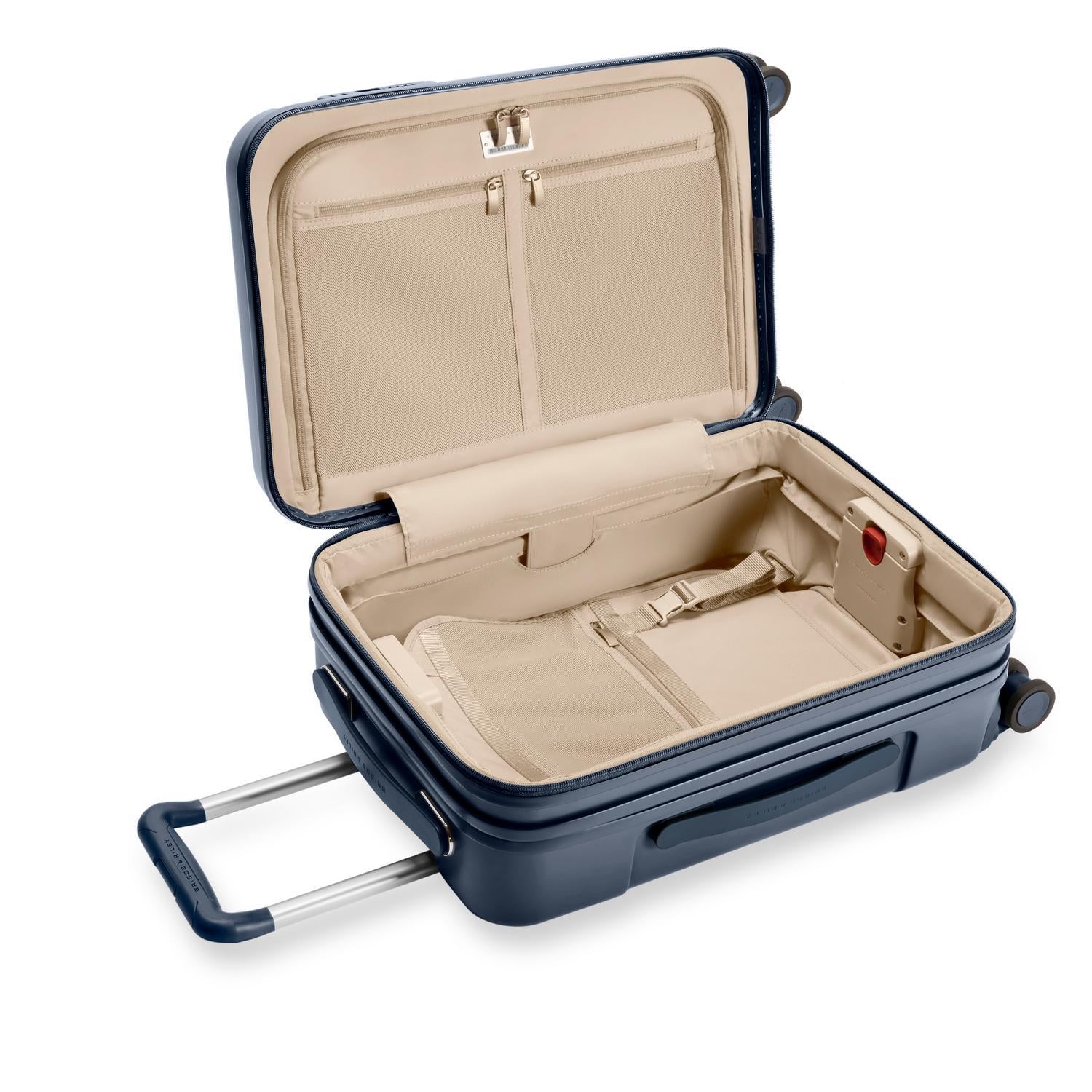Essential Front Pocket Carry-On Expandable Spinner in Navy, Front View #color_navy