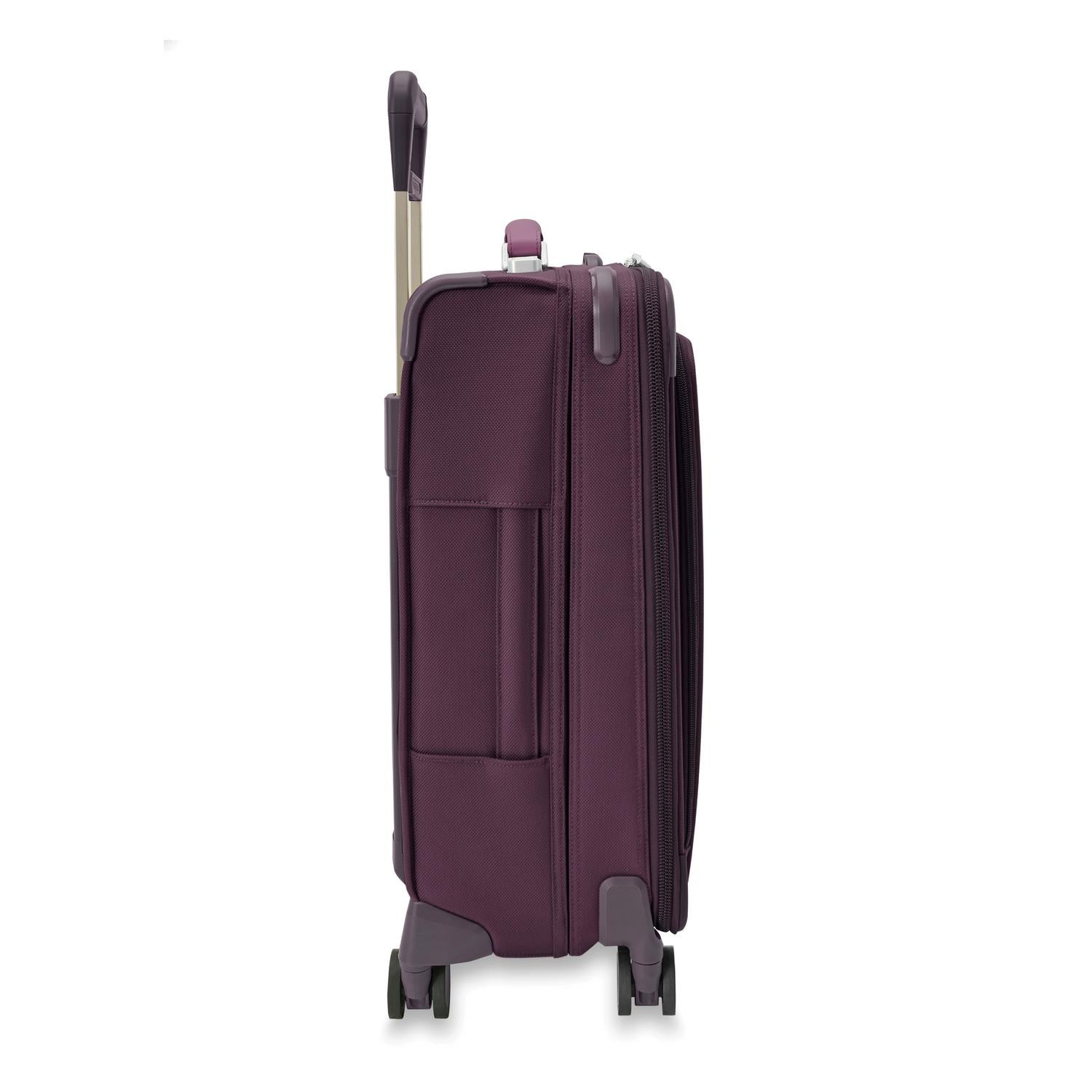 Baseline Essential 22" Carry-On Expandable Spinner Plum Side View #color_plum