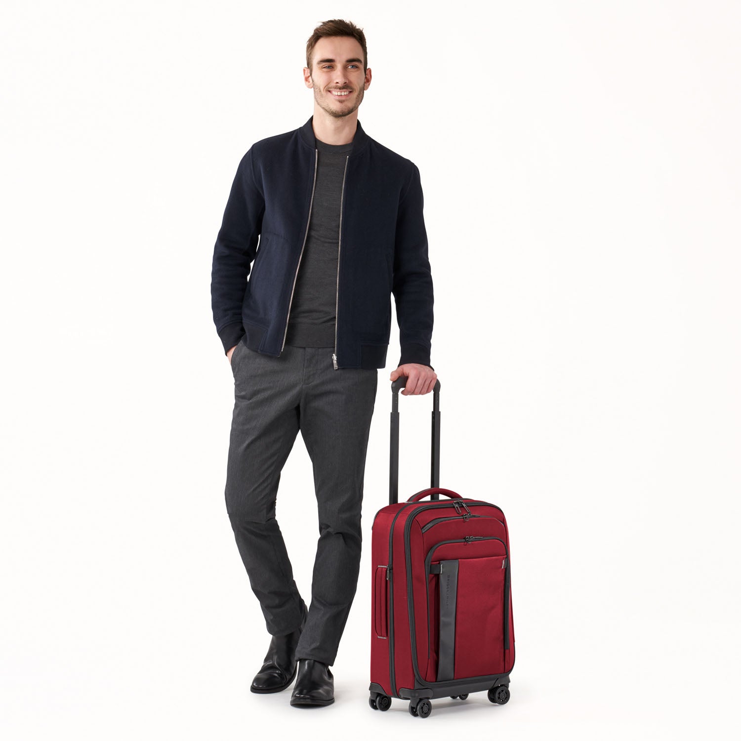 Briggs and Riley ZDX Domestic 22" Carry-On Expandable Spinner Brick with Person #color_brick